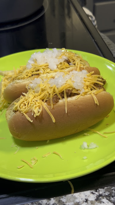 Tulsa style coney sauce over hot dogs with cheddar