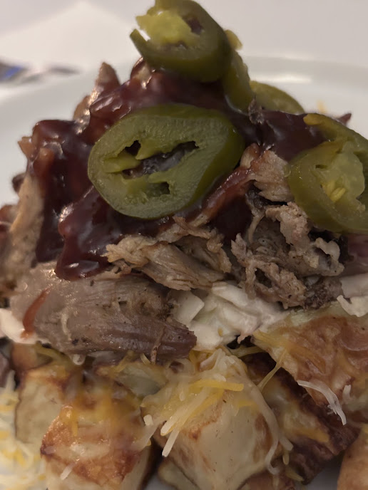 Fully loaded air fried potatoes with barbecue slaw and pulled pork