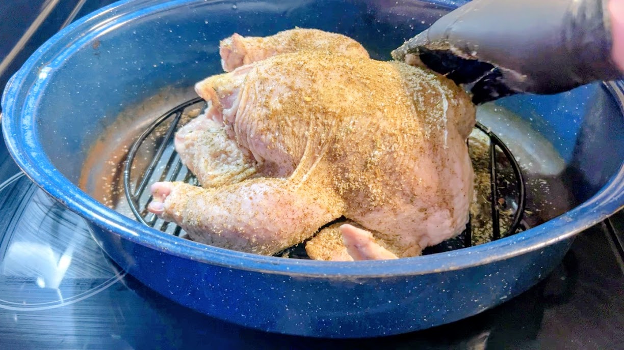 Whole chicken coated with dry brine seasoning